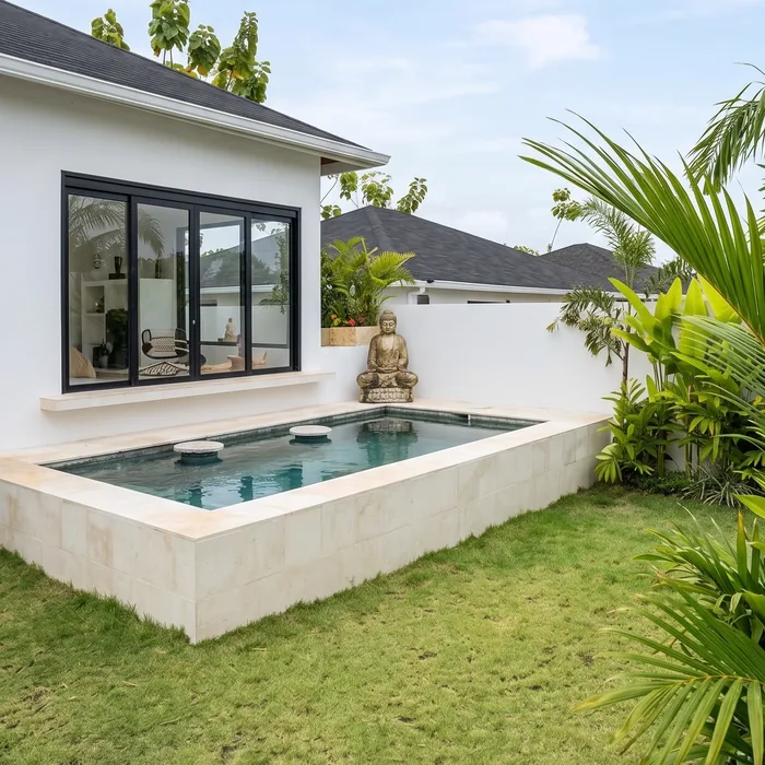 Villa Sayan IV exterior with private plunge pool, Buddha statue and garden