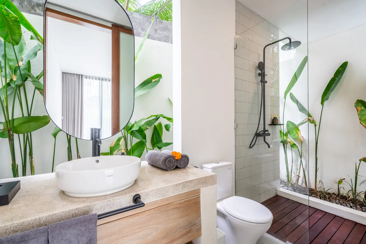 Villa Jucca bathroom with freestanding tub and rain shower