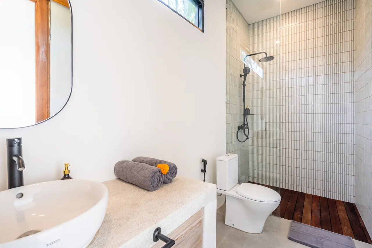 Villa Jucca bathroom vanity and walk-in shower