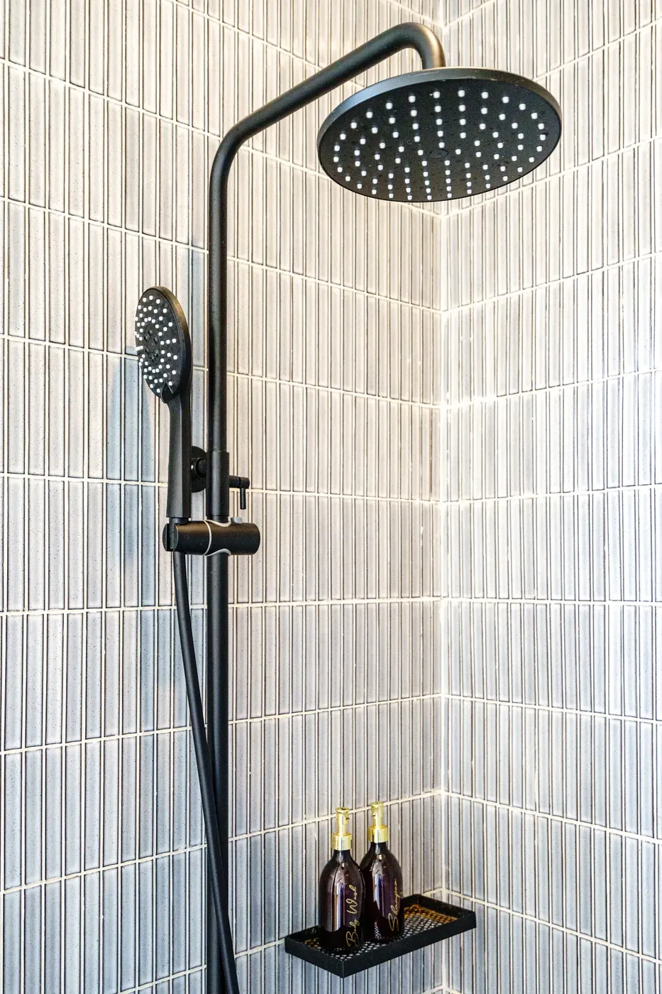 Villa Oasis rain shower with grey stack-bond tile