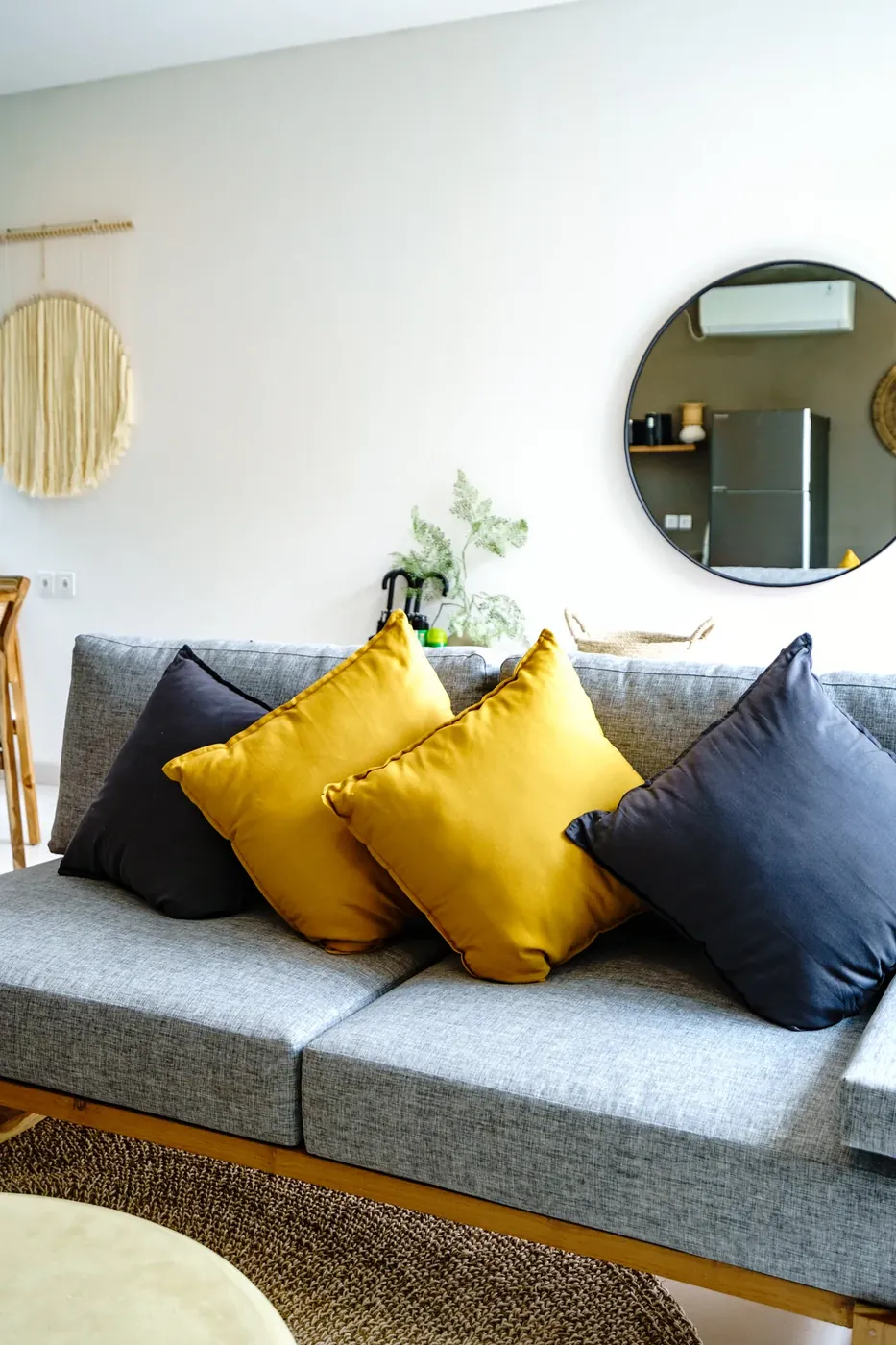 Villa Oasis indoor daybed nook with mustard cushions