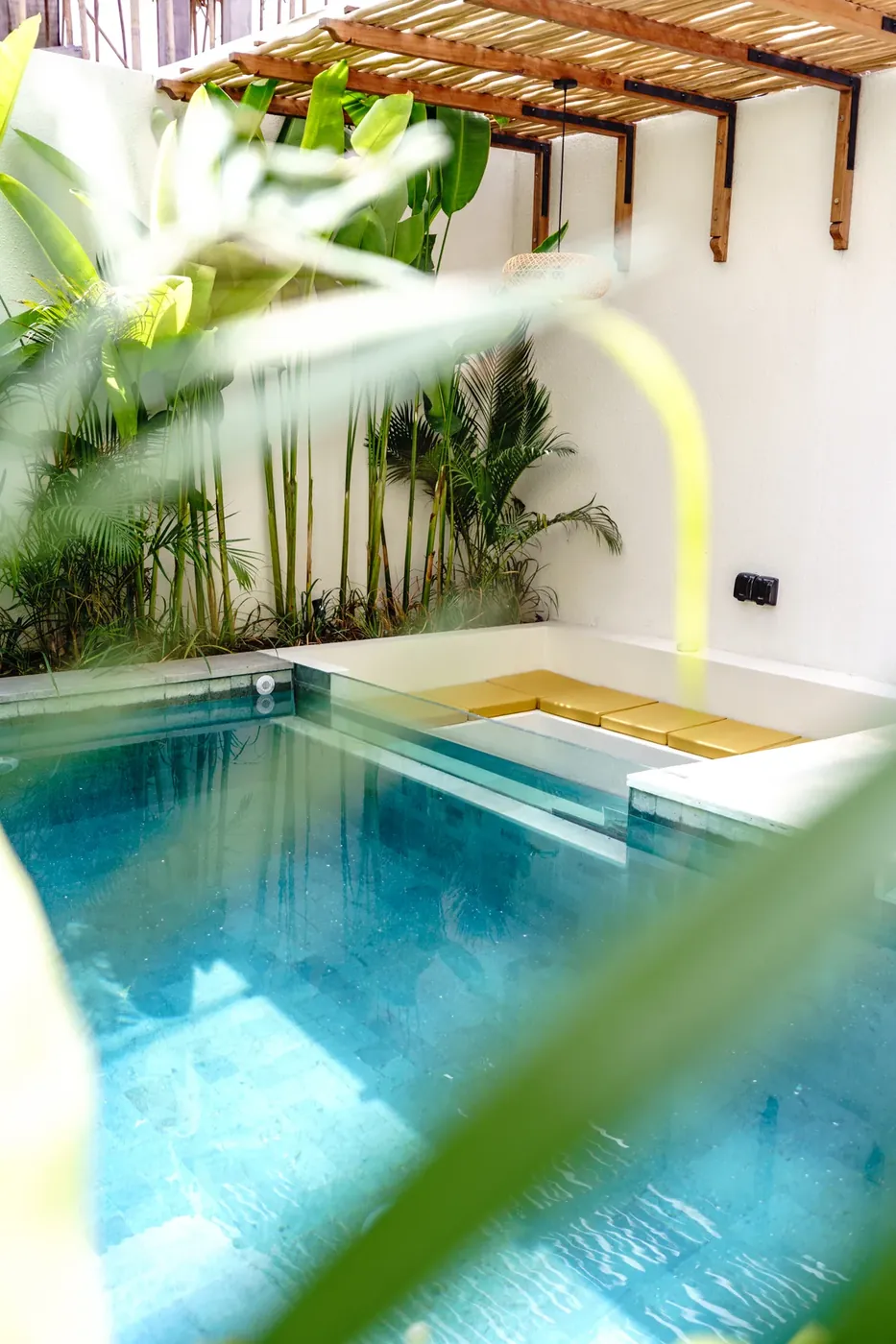 Villa Oasis private plunge pool with sunken seating and tropical garden