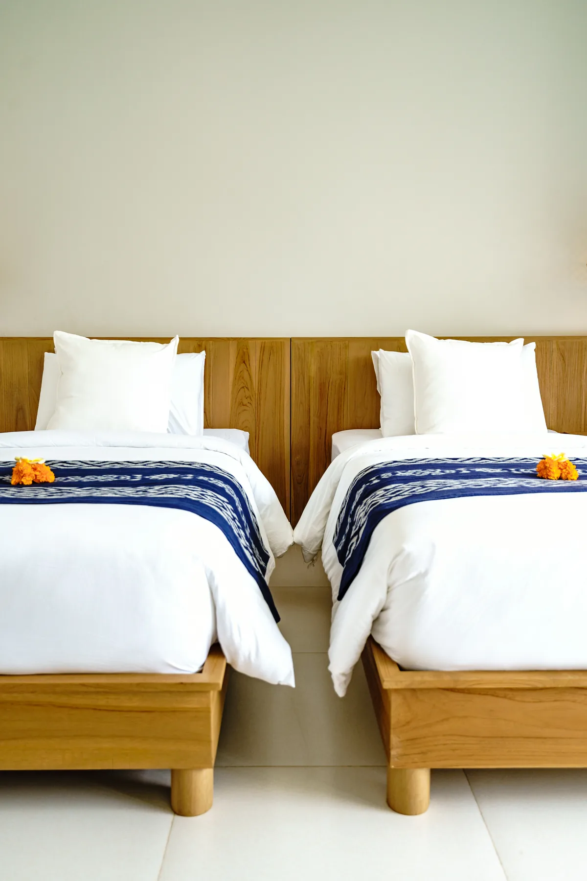 Villa Oasis twin bedroom dressed in indigo ikat
